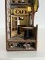 Preview: Cafe de Champs-Elysées - Book Nook - Eingang mit Tisch und Lampe